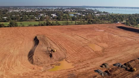 Yarrawonga,-Victoria,-Australia---18-April-2023:-Aerial-view-of-two-excavators-working-at-earthworks-site-at-Black-Bull-Golf-Club-Yarrawonga