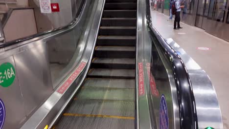 isolated-moving-escalator-going-up-from-flat-angle-at-morning-video-is-taken-at-new-delhi-metro-station-new-delhi-india-on-Apr-10-2022