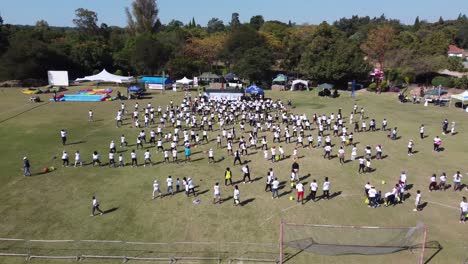 Drone-video-of-a-Group-Exercise-at-a-field-in-Bulawayo,-Zimbabwe
