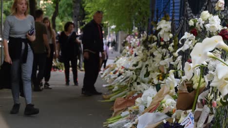 People-in-Belgrade-paying-tribute-near-wall-of-flowers-because-of-school-shooting
