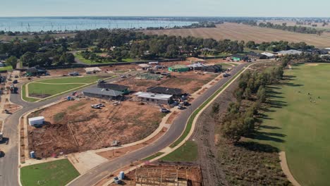 Yarrawonga,-Victoria,-Australia---18-April-2023:-Pan-across-the-golf-course-to-the-new-building-estate-at-Silverwoods-in-Yarrawonga
