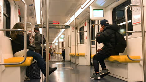 Inside-the-yellow-Metro-of-Milan-almost-empty-with-few-people