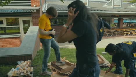 A-group-of-students-help-clean-up-cardboard-boxes-on-the-campus-of-Chalmers-University