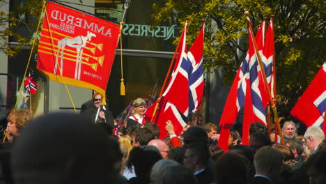 The-17th-of-May-celebrations-as-Norwegians-celebrate-constitution-day-with-traditional-dress-and-flag-waving-in-Norway