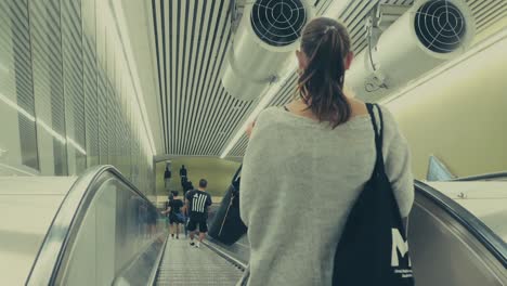 People-On-A-Downwards-Moving-Escalator-To-The-Subway-Of-Stockholm