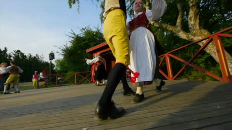 Musicians-play-the-violin-for-the-performance-of-the-traditional-Scandinavian-folk-dance-presented-by-couples-during-Midsummer-in-Sweden