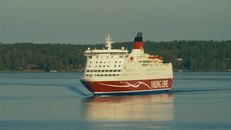 Drone-shot-of-a-big-ferry-sailing-in-front-of-the-Nordic-coast