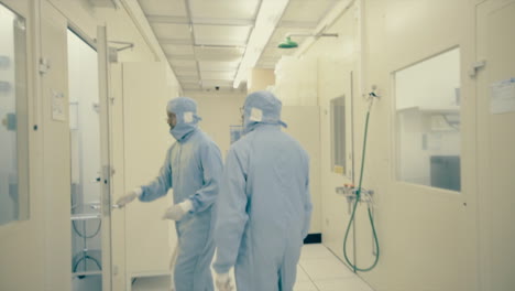 Rare-footage-from-inside-of-a-specialized-cleanroom-Laboratory-where-technology-is-developed-where-a-scientist-is-walking-through-nano-technology-cleanroom-facility