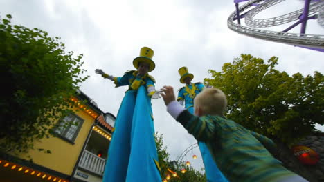 Fairground-entertainers-fill-the-amusement-park-bringing-joy-and-cheer-to-visiting-children-and-adults