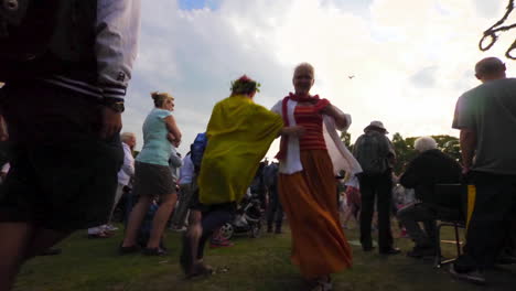 People-of-all-ages-gather-together-and-dance-and-celebrate-the-Midsummer-festival-of-Maypole