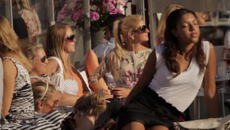 People-Enjoy-Themselves-In-A-Social-Setting-Near-Stockholm's-Beautiful-Waterways