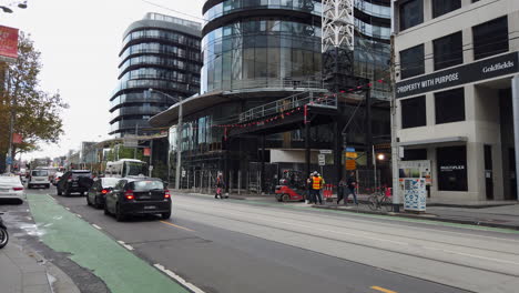 Near-completed-Capitol-Grand-building,-South-Yarra,-Victoria,-Australia,-residential-and-commercial-building,-street-view-with-construction-entrance,-corner-of-Toorak-Rd,-Chapel-St