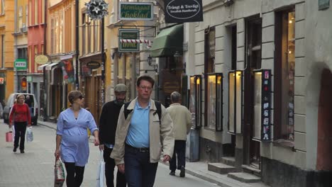 People-Walking-Through-Stockholm's-Scenic-Old-Town-Walking-Street