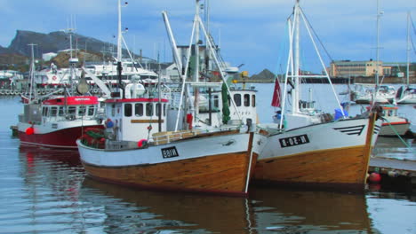 Video-with-movement-of-two-boats-in-port-and-in-the-background-more-boats-and-some-mountains-of-the-coast