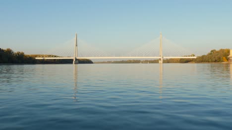 Dolly-shot-with-the-Megyeri-Bridge-in-Budapest,-Hungary-on-a-sunny-day