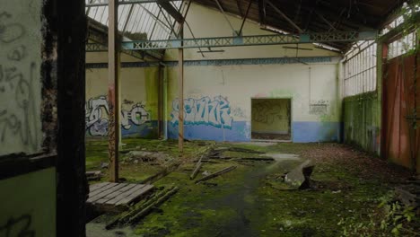 POV-Walking-Past-Destroyed-Rooms-And-Into-Empty-Abandoned-Warehouse
