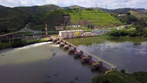 Sunlight-on-hydroelectric-power-plant-and-Santa-Cecília-Dam,-Brazil