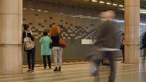 People-waiting-for-tram-at-underground-station-in-Budapest,-Hungary