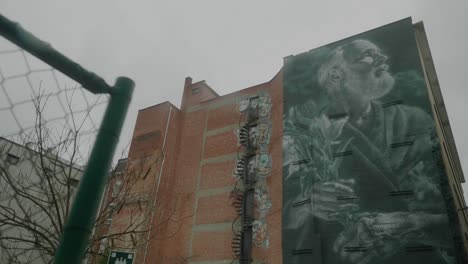 Mac-Art-Mural-Street-Art,-Belgium,-Symbolic-Father,-Urban-Man,-Antwerp