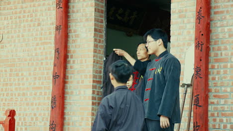 Playful-Kids-in-Oriental-Uniform-at-Martial-Arts-School-Entrance