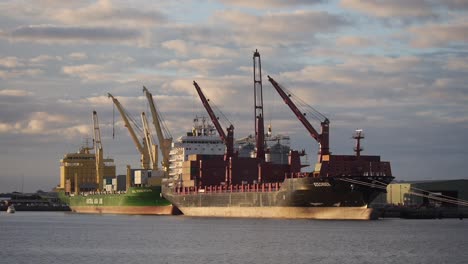Two-cargo-ships-berthed-at-the-port-of-Newcastle-at-sunset
