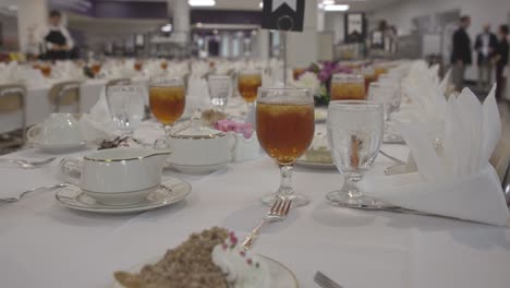 Slow-motion-reveal-of-drinks-and-cake-at-a-reception