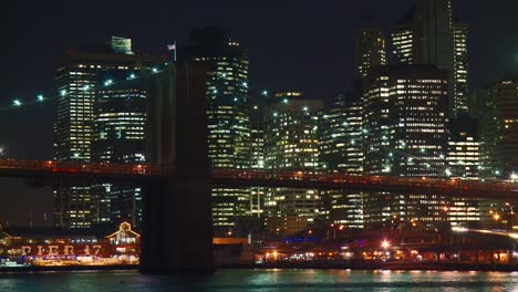 Lower-Manhattan-skyline-and-Brooklyn-Bridge-at-night