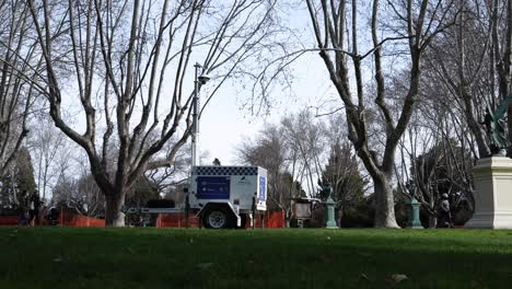 Police-CCTV-security-trailer-in-Melbourne-park-for-Covid-distancing-lockdown-monitoring