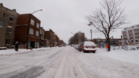 POV-Travelling-Through-Winter-Snow-Covered-Road-In-Hochelaga-Neighbourhood-During-Winter-In-January-2002