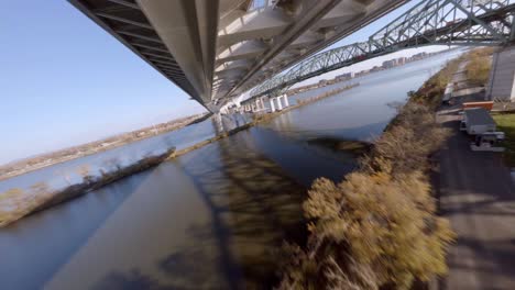 FPV-Acrobatic-Flying-Close-To-Samuel-De-Champlain-Bridge-Over-Saint-Lawrence-River