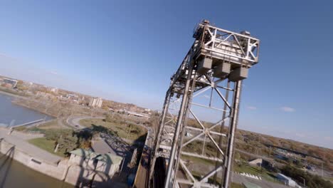FPV-Acrobatic-Flying-And-Diving-Around-Victoria-Bridge-Over-Saint-Lawrence-River