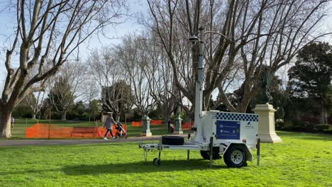 Police-CCTV-security-camera-in-Australia-for-Covid-distancing-lockdown-monitoring-in-park