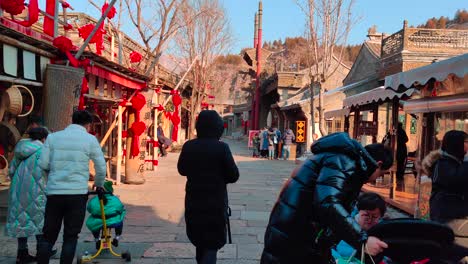 In-January-2020,-before-al-frontiers-were-closed,-tourists-enjoyed-the-last-days-of-travel-in-Gubei-Water-Town-before-isolation-due-to-covid-restrictions