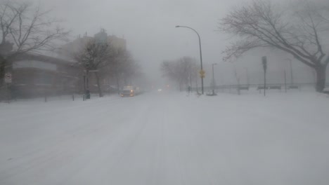 POV-Driving-Along-Through-Snow-Blizzard-In-Verdun-Neighbourhood-Of-Montreal