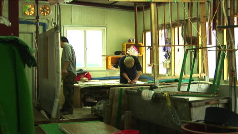 Inside-Historical-Paper-Mill-in-China,-Worker-at-Work-Stations,-Medium