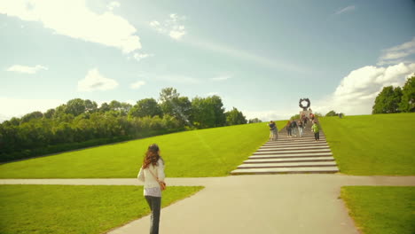 People-Enjoying-Leisure-Time-at-Frogner-Park-a-Summer-Day,-Oslo,-Norway,-POV