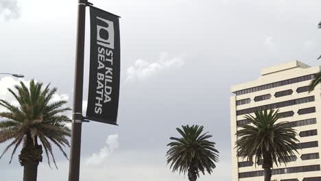 St-Kilda-Sea-Baths-flag-signage-with-palm-trees