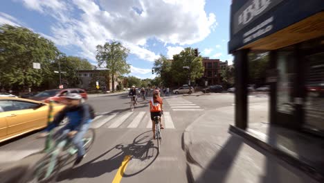 POV-Cycling-Along-Dedicated-Cycle-Lane-On-Rachel-Street-In-Montreal