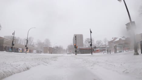 Timelapse-POV-Along-Winter-Snow-Covered-Pavements-In-Downtown-Montreal