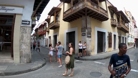Tourists-are-standing-and-walking-on-the-street-of-the-old-town-of-Cartagena-de-Indias