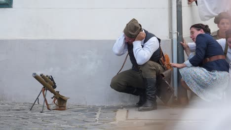 Rebels-hiding-behind-the-building-launching-grenade