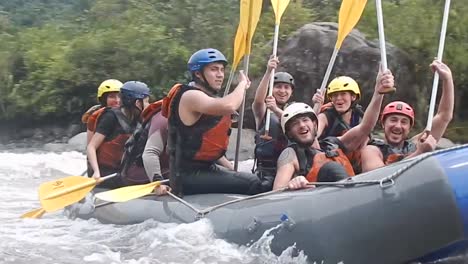 A-group-of-tourists-is-rafting-and-putting-their-oars-up-in-celebration-of-a-great-they