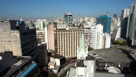 Drone-shot-following-the-Rua-Nestor-Pestana-street,-in-sunny-Sao-Paulo,-Brazil