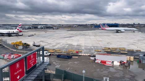 SLOW-MOTION-SHOT-OF-jfk-airport-in-manhattan-in-distant-view-on-a-cloudy-day