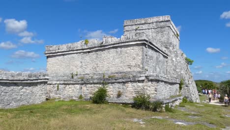 Tourists-around-El-Castillo's-sea-facing-wall