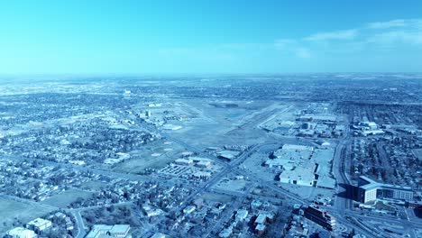 aerial-flyover-abandoned-downtown-airport-in-Edmonton-Alberta-demolition-efforts-to-clear-the-land-and-build-condo-housing-town-home-community-with-a-halt-on-efforts-to-rebuild-and-recycle-the-land