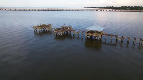 Aerial-footage-of-fishing-pier-at-Sunset-Point-Mandeville-Louisiana