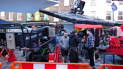 Film-industry-professionals-filming-a-movie-set-on-the-streets-of-Camdem-in-London