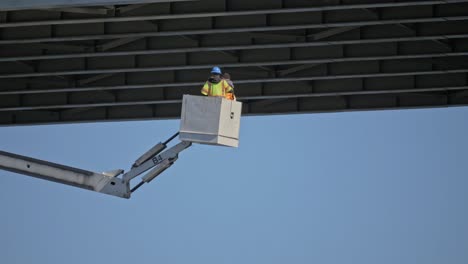 Under-Bridge-inspection-of-Snow's-Cut-Bridge-in-Carolina-Beach-North-Carolina-using-under-bridge-crane-truck-with-telescopic-hydraulic-arm