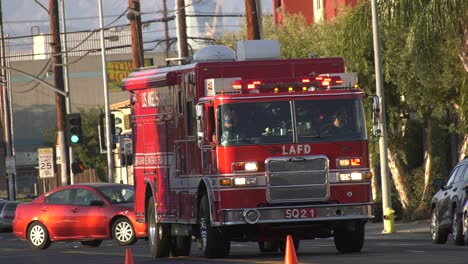 firefighting-truck-backing-up-on-busy-street